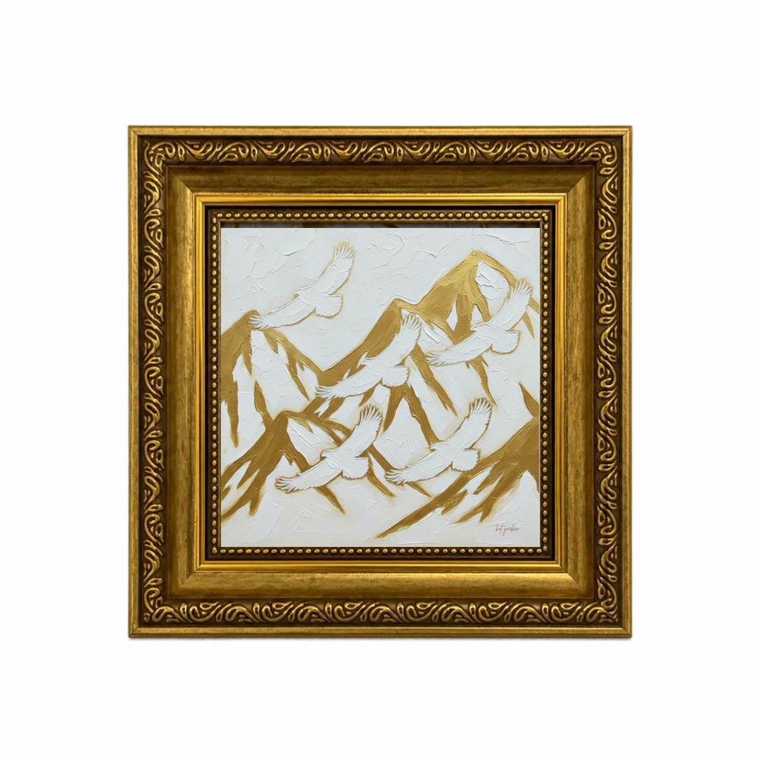 White birds flying above gold mountain peaks in an ornate gold frame